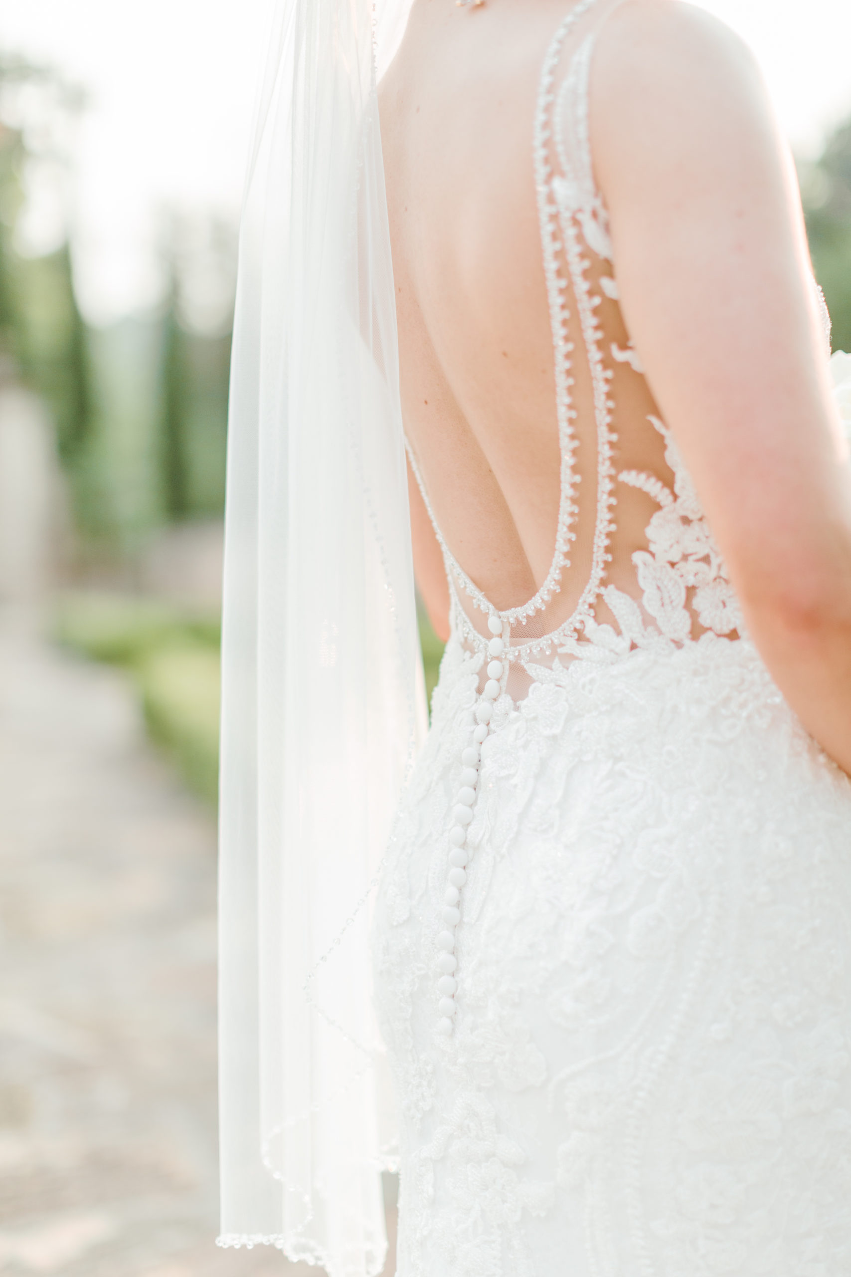Bride in a lace trumpet gown from Danielle's Bridal