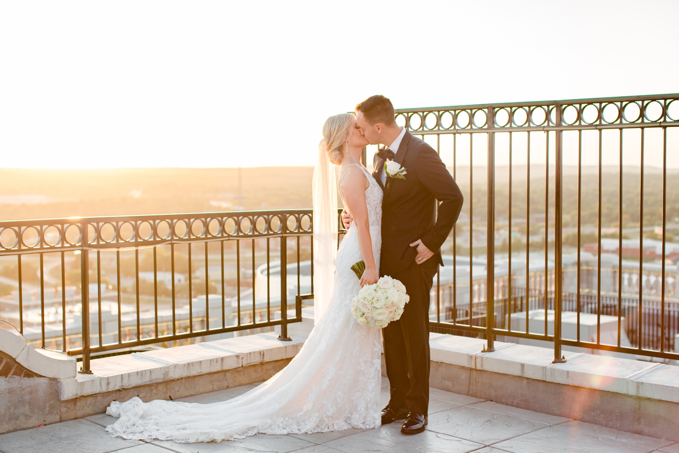 Sunset bride and groom portraits on the rooftop at The Mayo Hotel