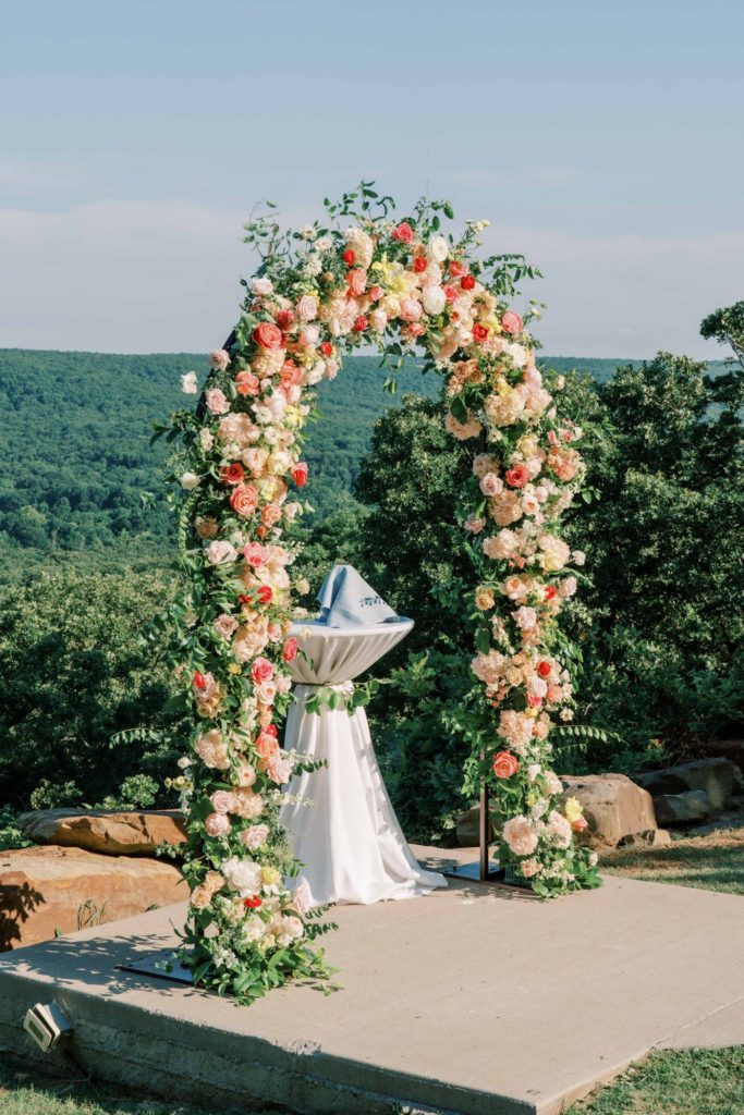 Large, colorful wedding arch by Ever Something