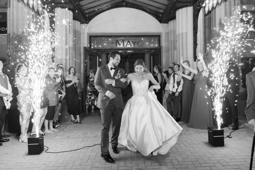 Black and white portrait of bride and groom's sparkler exit at The Mayo Hotel 