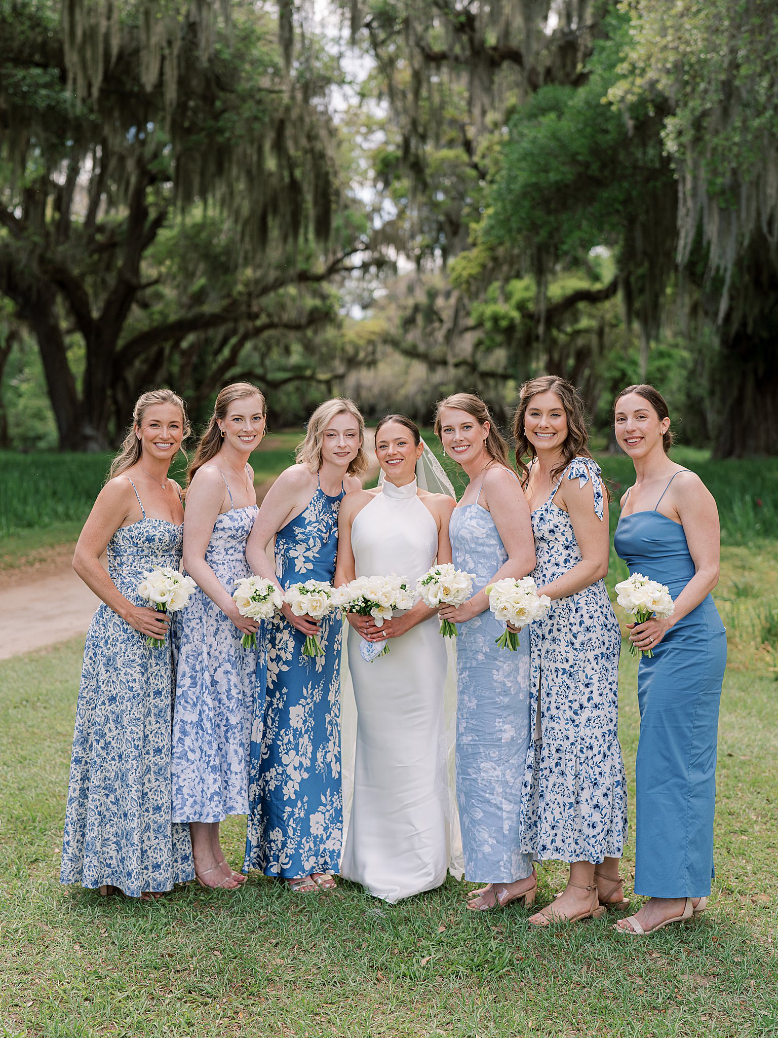 bridesmaids under oak trees at spring island wedding