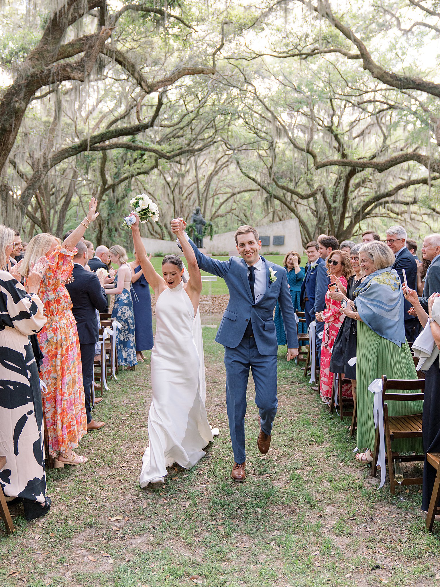bride and groom recessional joy at spring island wedding